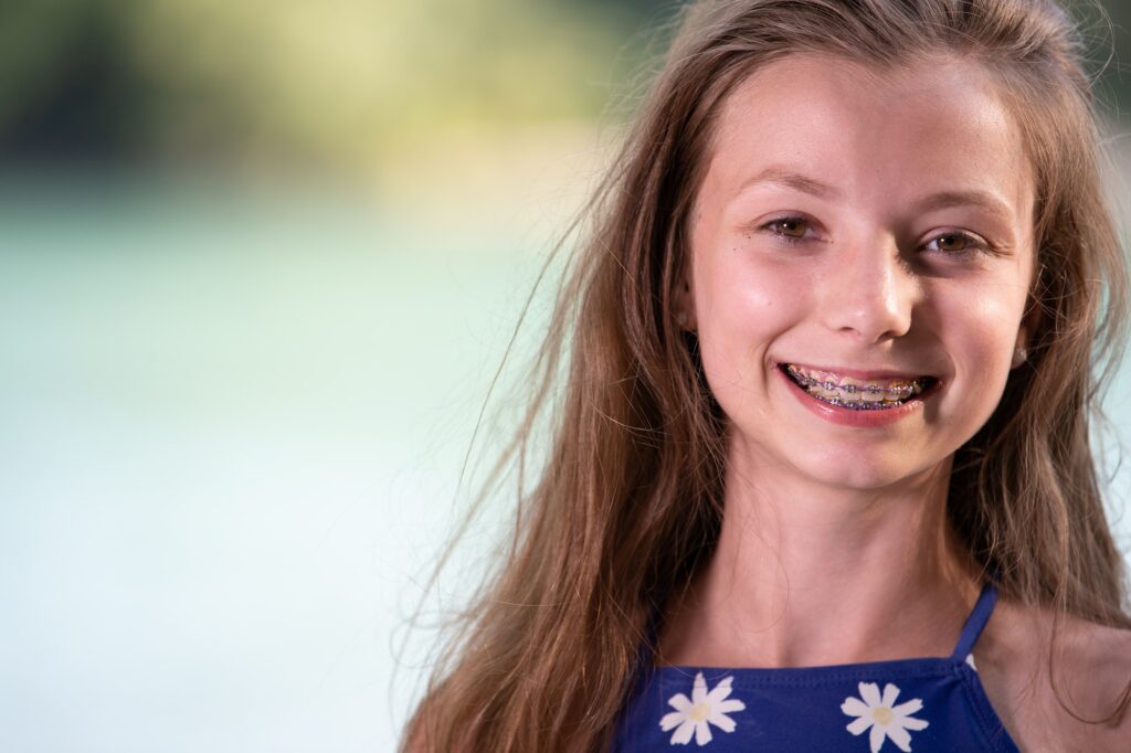 Teenage girl smiling with braces
